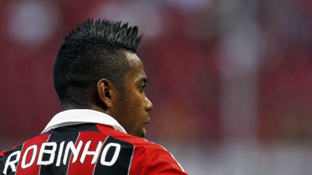 Atacante Robinho em ação durante a primeira partida do Milan no Campeonato Italiano