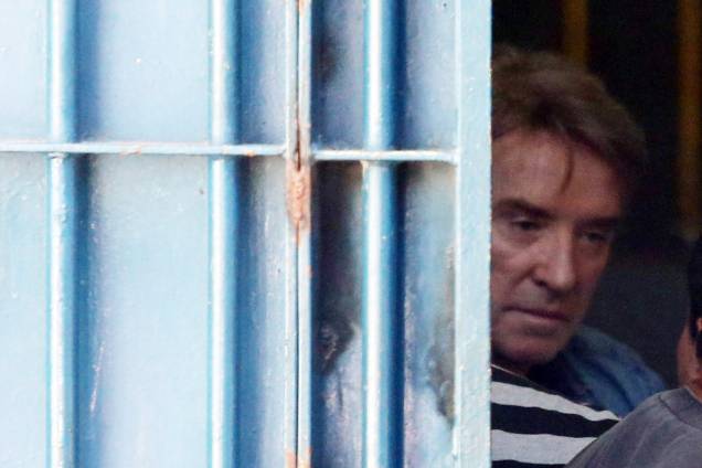 O empresário Eike Batista chega ao Presídio Ary Franco, em Água Santa, na zona norte do Rio de Janeiro, conduzido por policiais federais. Ele foi preso logo após desembarcar no Aeroporto Internacional Tom Jobim (Galeão), vindo de Nova York (EUA) - 30/01/2017 O empresário Eike Batista chega ao Presídio Ary Franco, em Água Santa, na zona norte do Rio de Janeiro, conduzido por policiais federais. Ele foi preso logo após desembarcar no Aeroporto Internacional Tom Jobim (Galeão), vindo de Nova York (EUA) - 30/01/2017