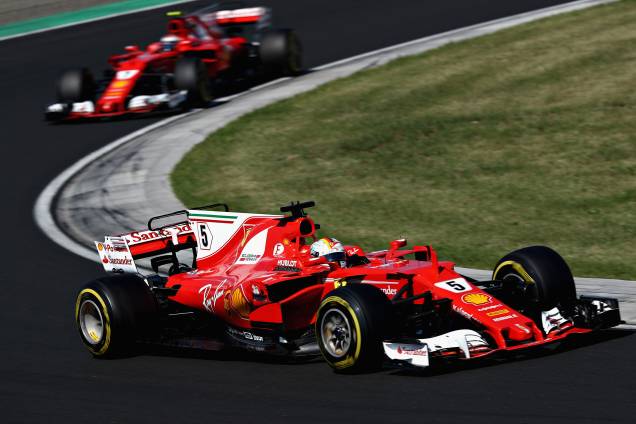 O alemão Sebastian Vettel e o finlandês Kimi Raikkonen da Ferrari fazem dobradinha no GP da Hungria - 30/07/2017 O alemão Sebastian Vettel e o finlandês Kimi Raikkonen da Ferrari fazem dobradinha no GP da Hungria - 30/07/2017