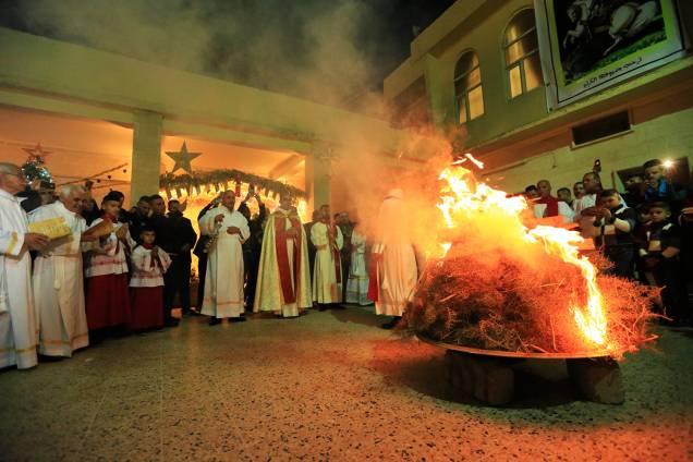 Iraquianos realizam missa de Natal na igreja de São Jorge, localizada na aldeia de Teleskuf - 24/12/2017 Iraquianos realizam missa de Natal na igreja de São Jorge, localizada na aldeia de Teleskuf - 24/12/2017
