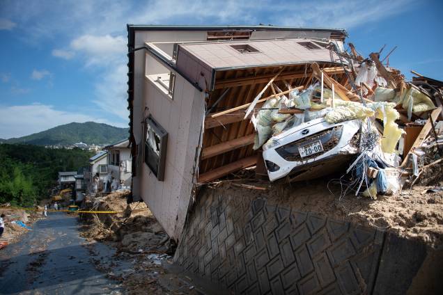 Casa fica seriamente danificada em uma área atingida pelas inundações em Kumano, prefeitura de Hiroshima, no Japão - 09/07/2018 Casa fica seriamente danificada em uma área atingida pelas inundações em Kumano, prefeitura de Hiroshima, no Japão - 09/07/2018