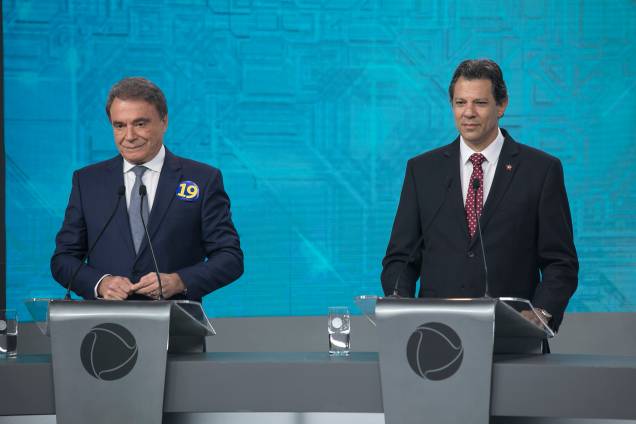 Alvaro Dias (Podemos) e Fernando Haddad (PT), durante debate entre presidenciáveis realizado pela TV Record, em São Paulo (SP) - 30/09/2018 Alvaro Dias (Podemos) e Fernando Haddad (PT), durante debate entre presidenciáveis realizado pela TV Record, em São Paulo (SP) - 30/09/2018