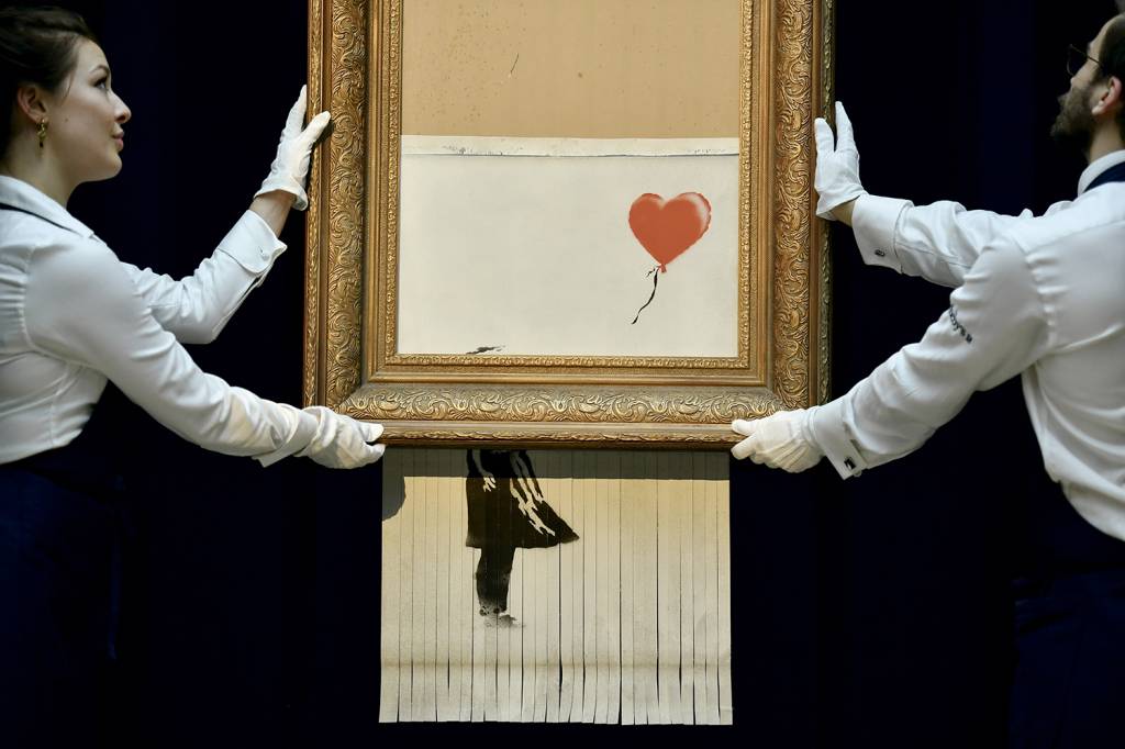 Obra de Banksy que se autodestruiu será leiloada novamente na Inglaterra