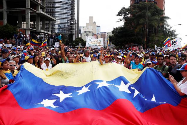 Manifestantes realizam marcha contra o presidente venezuelano Nicolás Maduro, em Caracas - 23/01/2019 Manifestantes realizam marcha contra o presidente venezuelano Nicolás Maduro, em Caracas - 23/01/2019