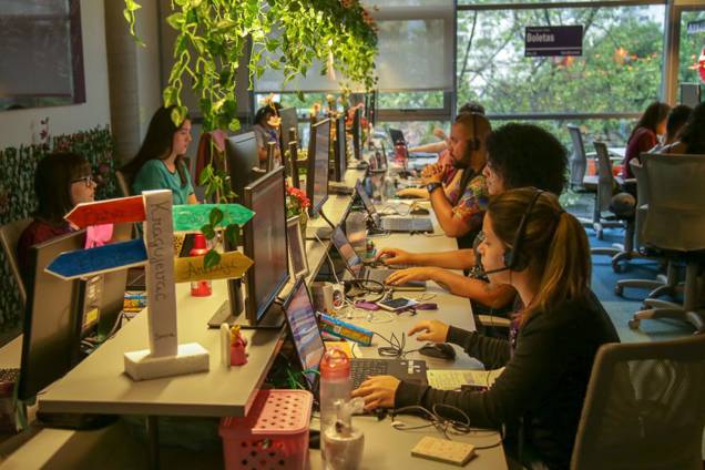 Funcionários trabalham em computadores no escritório do Nubank, em São Paulo. Funcionários trabalham em computadores no escritório do Nubank, em São Paulo.
