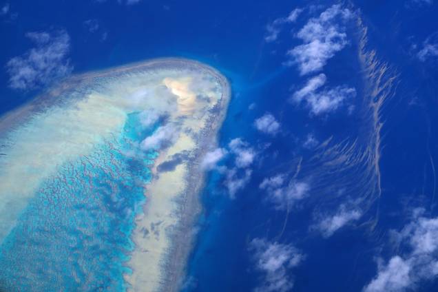 Ilha localizada na Grande Barreira de Corais, localizada na costa de Queensland, na Austrália Ilha localizada na Grande Barreira de Corais, localizada na costa de Queensland, na Austrália