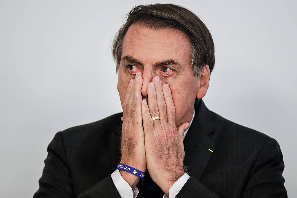 Brazil’s President Jair Bolsonaro gestures during a signing ceremony for 13.2 billion reais in contracts for electricity transmission lines, at the Planalto Palace in Brasilia Brazil’s President Jair Bolsonaro gestures during a signing ceremony for 13.2 billion reais in contracts for electricity transmission lines, at the Planalto Palace in Brasilia