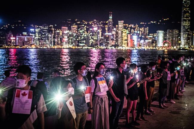 ‘Hong Kong Way’ by forming a human chain in support of democracy