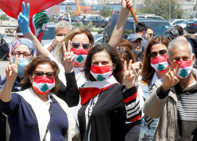 Demonstrators take part in a protest against the growing economic hardship in Beirut Demonstrators take part in a protest against the growing economic hardship in Beirut