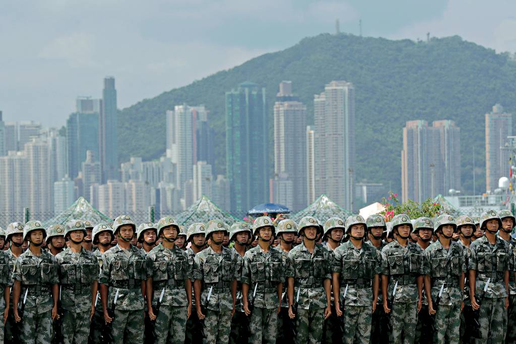 FILE PHOTO: The People’s Liberation Army (PLA) soldiers take part in a performance during an open day of Stonecutters Island naval base, in Hong Kong FILE PHOTO: The People’s Liberation Army (PLA) soldiers take part in a performance during an open day of Stonecutters Island naval base, in Hong Kong