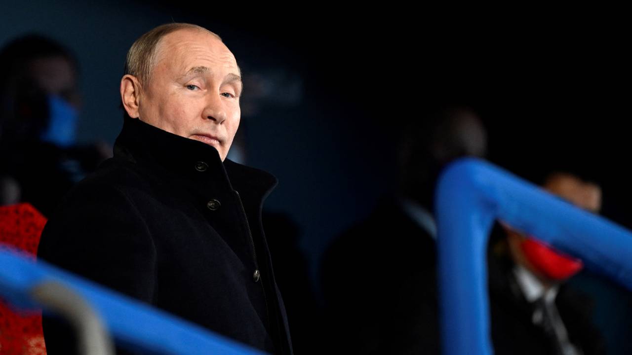 Russia's President Vladimir Putin looks on during the opening ceremony of the Beijing 2022 Winter Olympic Games, at the National Stadium, known as the Bird's Nest, in Beijing, on February 4, 2022. (Photo by WANG Zhao / AFP)