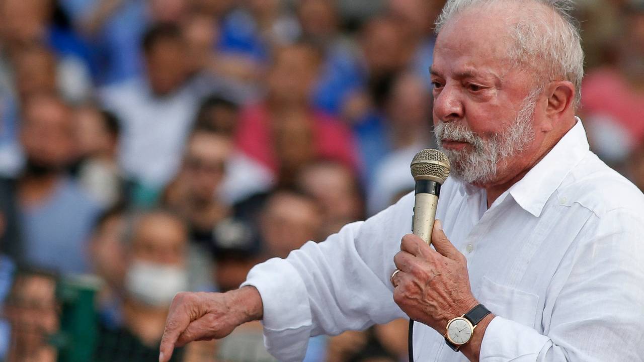 Brazilian presidential candidate for the leftist Workers Party (PT) and former President (2003-2010), Luiz Inacio Lula da Silva, delivers a speech during the launching of his campaign for the upcoming national elections in October on a rally at a Volkswagem car factory in Sao Bernardo do Campo, Sao Paulo, Brazil, on August 16, 2022. - Lula, 76, started his campaign with a visit to a Volkswagen plant in Sao Bernardo do Campo, in the industrial heartland of Sao Paulo state, where he launched his political career as a union leader. Lula currently leads with 44 percent of the vote to 32 percent for Bolsonaro, according to the latest poll from the Ipec institute, published Monday. (Photo by Miguel SCHINCARIOL / AFP)