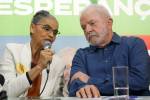 Brazilian Federal Deputy candidate Marina Silva (L) speaks next to presidential candidate for the leftist Workers Party (PT) and former President (2003-2010), Luiz Inacio Lula da Silva (R), during a press conference in Sao Paulo, Brazil, on September 12, 2022. (Photo by Miguel SCHINCARIOL / AFP)