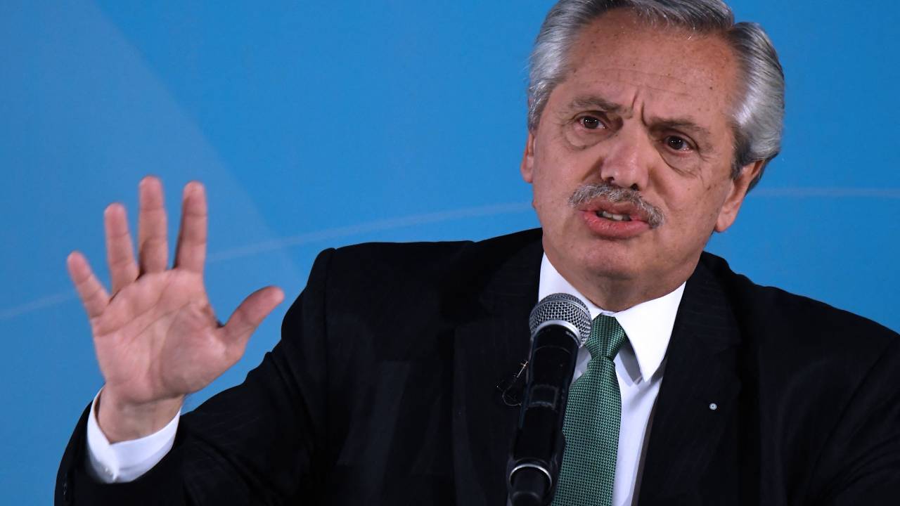 (FILES) In this file photo taken on May 23, 2022, Argentine President Alberto Fernandez speaks during the presentation of the new series of Argentine peso notes at the Bicentennial Museum of Casa Rosada Presidential Palace in Buenos Aires. - Fernandez was admitted to hospital in Buenos Aires on March 14, 2023, to undergo medical studies following acute back pain. (Photo by Luis ROBAYO / AFP)