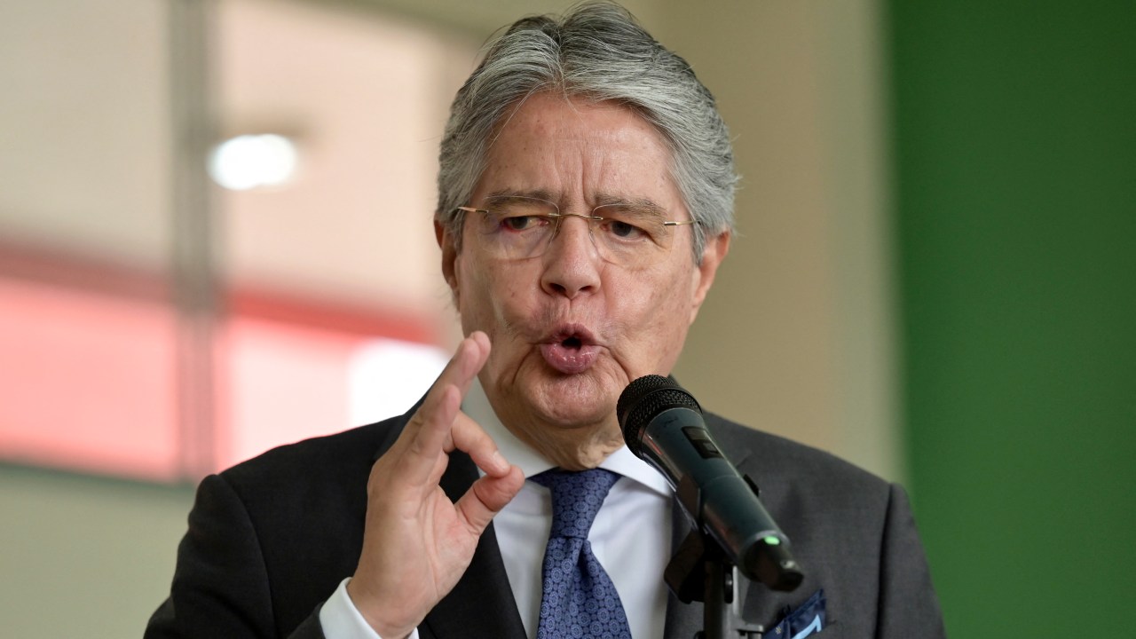 (FILES) In this file photo taken on February 5, 2023, Ecuadorean President Guillermo Lasso speaks to the press after casting his vote during the local election at the Ileana Espinel Cedeño school in Guayaquil, Ecuador. - The request for impeachment against the Lasso will go to the Constitutional Court, its last stage, after Congress sent the request on March 20, 2023, considering that it meets all the requirements. The Constitutional Court has the last word on whether or not to give the green light to the trial request against Lasso for an alleged case of corruption involving his brother-in-law and a former official of a public company. (Photo by MARCOS PIN / AFP)