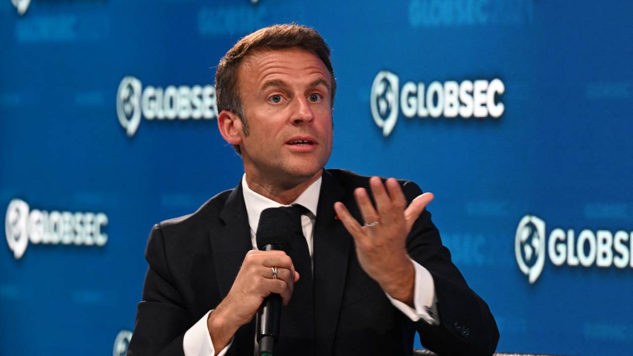 French President Emmanuel Macron speaks at the Globsec regional security forum in Bratislava, Slovakia, on May 31, 2023. (Photo by Michal Cizek / AFP)