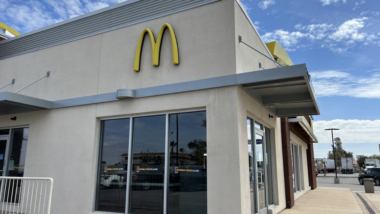 McDonald's facade with Mobile Order & Pay signage under a cloudy sky, Buttonwillow, California, April 7, 2023. (Photo by Smith Collection/Gado/Getty Images)