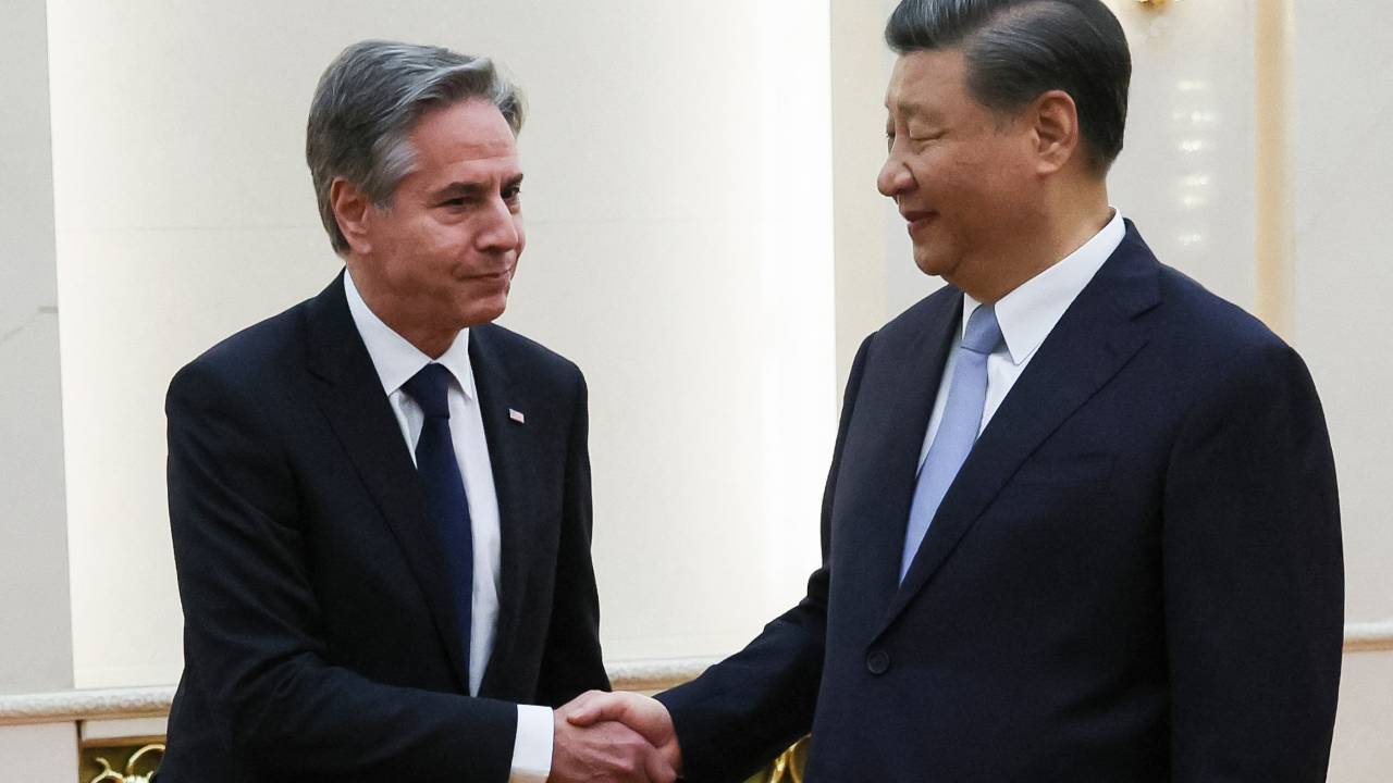 US Secretary of State Antony Blinken (L) shakes hands with China's President Xi Jinping at the Great Hall of the People in Beijing on June 19, 2023. President Xi Jinping hosted Antony Blinken for talks in Beijing on June 19, capping two days of high-level talks by the US secretary of state with Chinese officials. (Photo by Leah MILLIS / POOL / AFP)