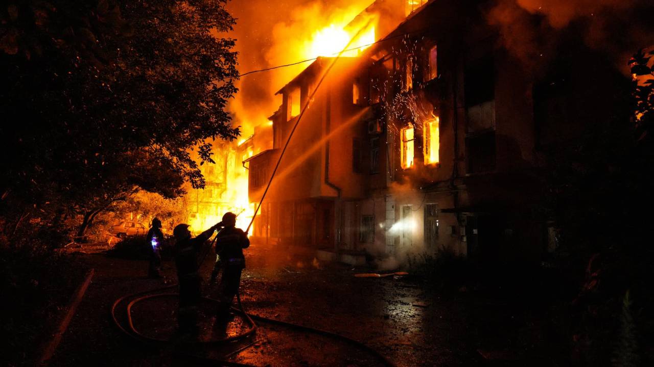 This handout photograph taken and released by the Ukrainian Emergency Service on July 20, 2023 shows rescuers extinguishing a fire at a destroyed residential building after a missile strike in the centre of Mykolaiv, amid the Russian invasion of Ukraine. (Photo by Handout / Ukraine Emergency Service / AFP) / RESTRICTED TO EDITORIAL USE - MANDATORY CREDIT "AFP PHOTO / " - NO MARKETING NO ADVERTISING CAMPAIGNS - DISTRIBUTED AS A SERVICE TO CLIENTS
