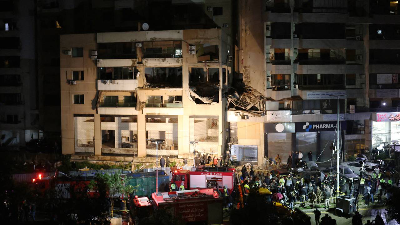 Lebanese emergency responders gather at the site of a strike, reported by Lebanese media to be an Israeli strike targeting a Hamas office, in the southern suburb of Beirut on January 2, 2024. Hamas deputy leader Saleh al-Aruri was killed in an Israeli strike on Beirut's southern suburbs, on January 2, 2024, two security officials told AFP, with state media reporting the strike hit a Hamas office. (Photo by Anwar AMRO / AFP)