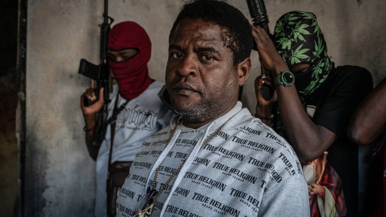PORT-AU-PRINCE, HAITI - FEBRUARY 22: Gang Leader Jimmy 'Barbeque' Cherizier with G-9 federation gang members in the Delmas 3 area on February 22, 2024 in Port-au-Prince, Haiti. There has a been fresh wave of violence in Port-au-Prince where, according to UN estimates, gangs control 80% of the city. (Photo by Giles Clarke/Getty Images)