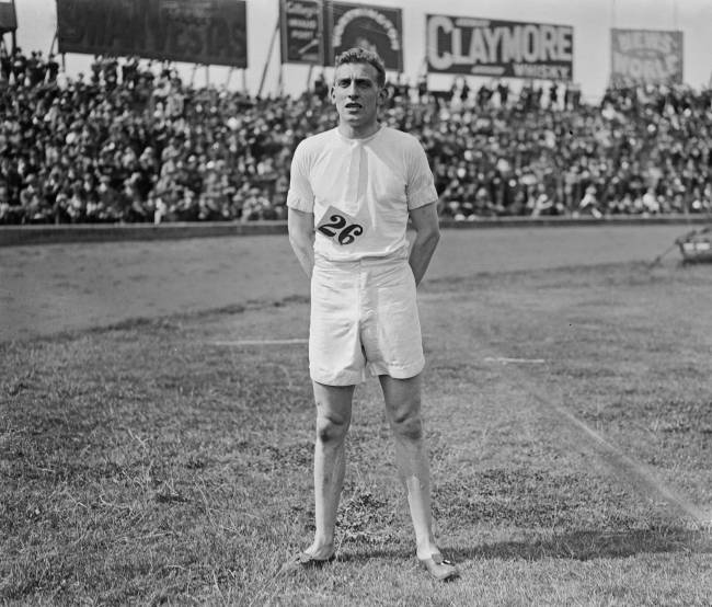 English sprinter Harold Abrahams (1899-1978), winner of the Men's 100 yards event at the Amateur Athletics Association (AAA) Championships at Stamford Bridge stadium in London in June 1924. Harold Abrahams would go on to win the gold medal for Great Britain in the Men's 100 metres event at the 1924 Summer Olympics in Paris, France on 7th July. (Photo by Arthur. R. Coster/Topical Press Agency/Hulton Archive/Getty Images)