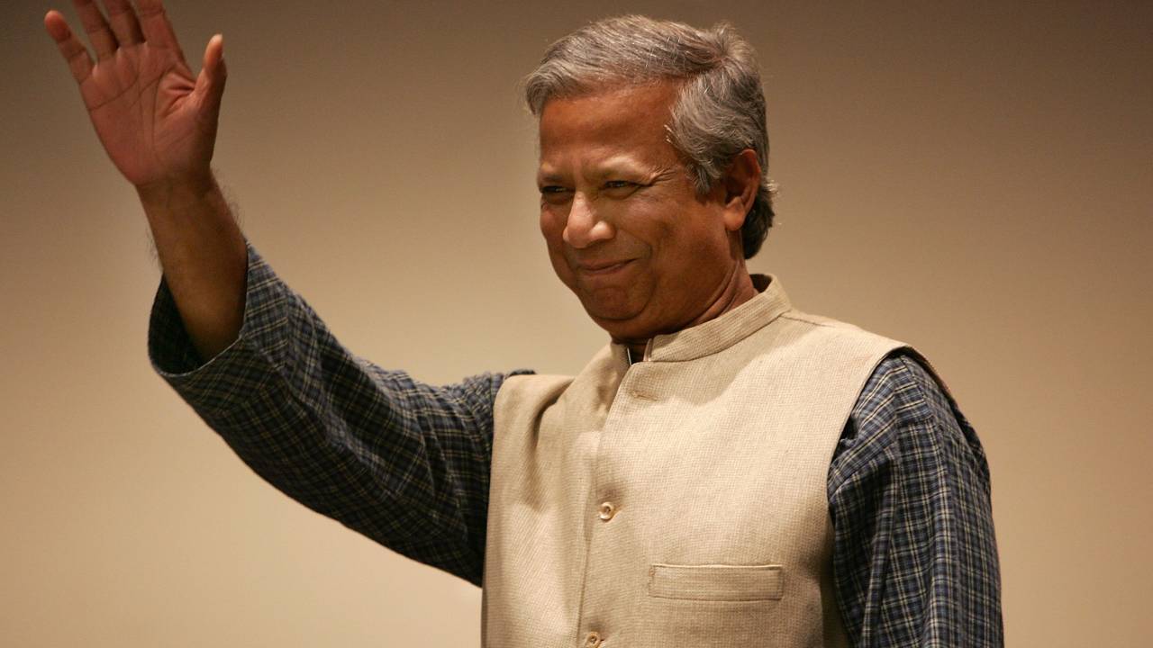NEW YORK - NOVEMBER 17: Nobel Peace Prize winner in 2006 Muhammad Yunus waves as he attends a gathering in his honor at the United Nations November 17, 2006 in New York City. Yunus, founder and managing director of the Grameen Bank of Bangladesh, pioneered micro-credit loans to become a key instrument in the struggle against chronic poverty. (Photo by Spencer Platt/Getty Images)