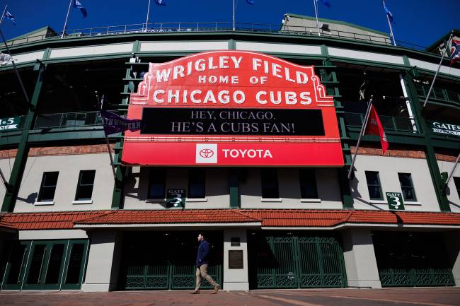 "Hey, Chicago. He's a Cubs fan!" reads the Wrigley Field marquee in Chicago on Thursday, May 8, 2025, after Cardinal Robert Prevost, a Chicago native, was chosen as the 267th pontiff. (Armando L. Sanchez/Chicago Tribune/Tribune News Service via Getty Images)